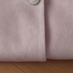 ピンクのコートの画像