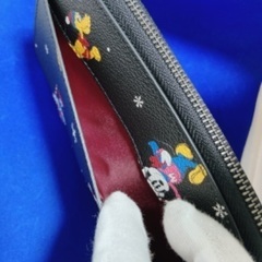 値下げ新品COACHコーチ アコーディオン ホリディ ディズニープリントの画像