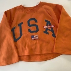 トレーナー140cm  オレンジ色の画像