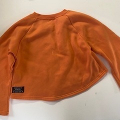 トレーナー140cm  オレンジ色の画像