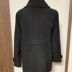 黒コートの画像