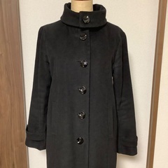 黒コートの画像