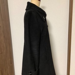 黒コートの画像