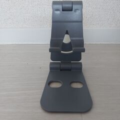 グレーの折りたたみ式携帯電話/スマートフォン スタンド - 新品同様の画像