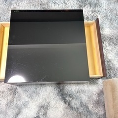 ガラステーブル（収納あり）の画像