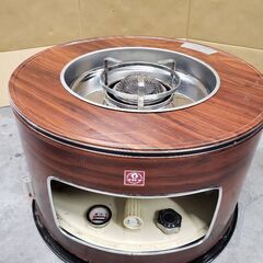 丸い形の石油ストーブの画像