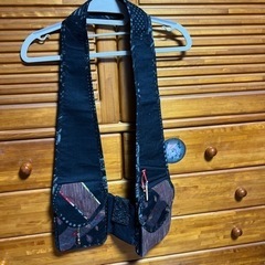 首に掛けて使います