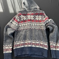 フード付きニットの画像