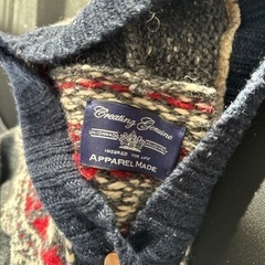 フード付きニットの画像