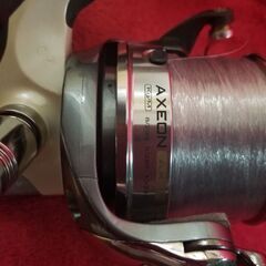 大型スピニングリール　Okuma  axeon  中古品　スプール予備✖️1の画像