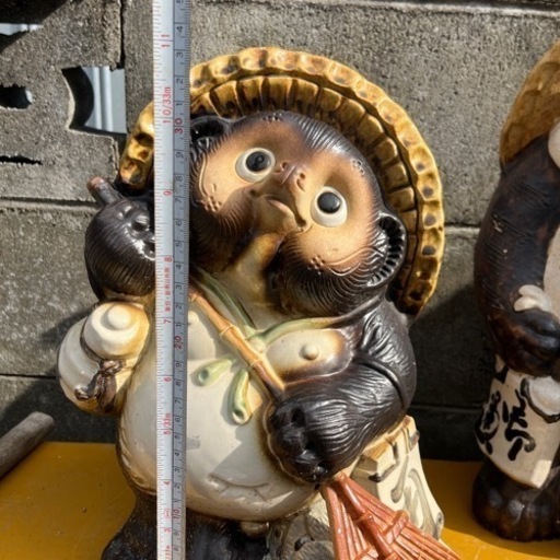 お掃除たぬき置物