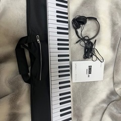 【商談中】電子ピアノ61鍵盤&ヘッドホンの画像