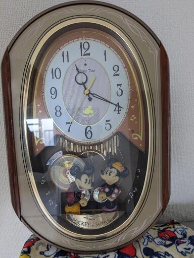 ディズニーのメロディーと仕掛けの壁時計