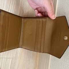 coach 三つ折り財布の画像