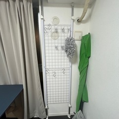 突っ張り棒　物置