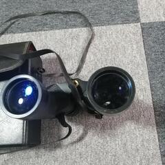 商談中　双眼鏡の画像