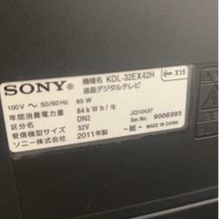 テレビ、テレビ台、DVDプレーヤーの画像