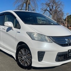 コミコミ🚘車検付！ハイブリッド！9インチナビ！ドラレコ！リアモニター！バックカメラ！両側パワースライドドア！ETC！クルコン！アイドリングストップ！修復歴無し！フリードハイブリッド！乗って帰れます！の画像