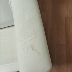 ソファー　赤のチェックのカバー付きの画像