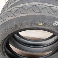 処分特価!バイクタイヤチューブレス100/80-10 46Jパンク履歴2本無しの画像