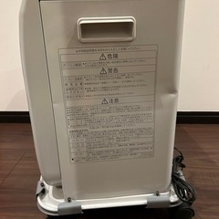 【値下げしました！3/8処分予定】コロナ石油ファンヒーター（キャスター付き）の画像