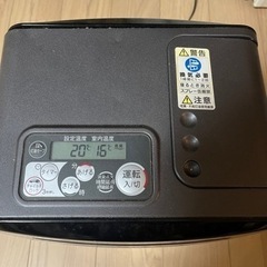石油ストーブ(トヨトミ)と灯油タンク、ポンプセットの画像