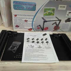 美品　未使用品　パソコンスタンド	ベッドでもソファでも、自由にパソコンを使える　折りたたみスタンド　自由な角度から使用 観賞できる 折りたたみ テーブル ベッドでもソファでも、自由にパソコンを使える　折りたたみスタンド、非常に便利　パソコンを 自由な角度から使用 観賞できるパソコンスタンド　E-T6BK　ブラックの画像