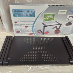 美品　未使用品　パソコンスタンド	ベッドでもソファでも、自由にパソコンを使える　折りたたみスタンド　自由な角度から使用 観賞できる 折りたたみ テーブル ベッドでもソファでも、自由にパソコンを使える　折りたたみスタンド、非常に便利　パソコンを 自由な角度から使用 観賞できるパソコンスタンド　E-T6BK　ブラックの画像