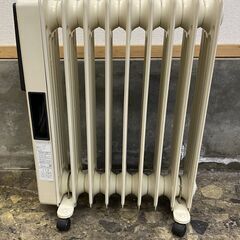 ドイツ製オイルヒーター １００V 3段階切換４００/８００/１２００W タイマーセットONのみ12Hmax TOYOTOMIの画像