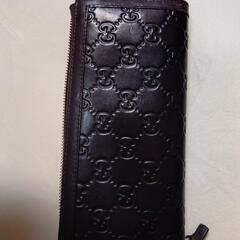 ¥1000お値下げしました！GUCCIラウンドファスナーシマ　ブラウンの画像