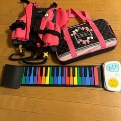 新品のお習字セットと、モンベルのライフジャケット