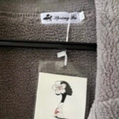 新品未使用コートの画像