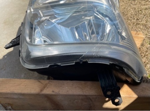 日産NV100クリッパーバン ハロゲンヘッドライト右側 中古品
