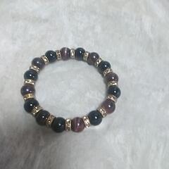 新品未使用品のオニキスとタイガーアイブレスレット