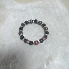 新品未使用品のオニキスとタイガーアイブレスレットの画像