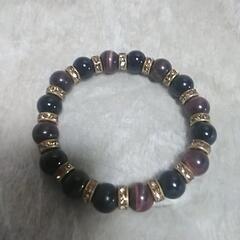 新品未使用品のオニキスとタイガーアイブレスレットの画像