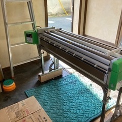 クロス糊付け機