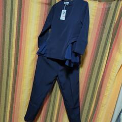 新品　セレモニー対応のツーピースの画像