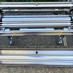 クロス糊付け機