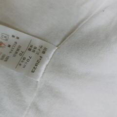 哺乳瓶+洋服の画像