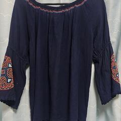 刺繍入り服の画像