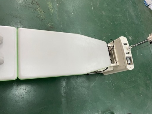 自動間欠牽引装置