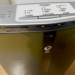 加湿空気清浄機と取説の画像