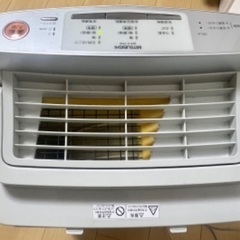 加湿空気清浄機と取説の画像