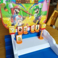 ゲームセンターの遊びおもちゃスーパーマリオの画像