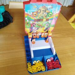 ゲームセンターの遊びおもちゃスーパーマリオ