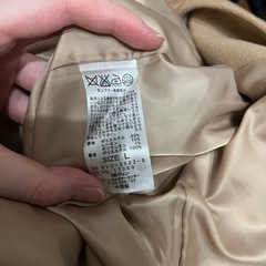 vis  ノーカラーベージュロングコートの画像