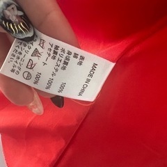 バナナリパブリックのコーラルオレンジジャケットの画像