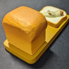 concombre／コンコンブル お昼寝パン スマホスタンド 猫 ハチワレの画像