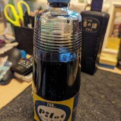 タンブラーと墨汁の画像